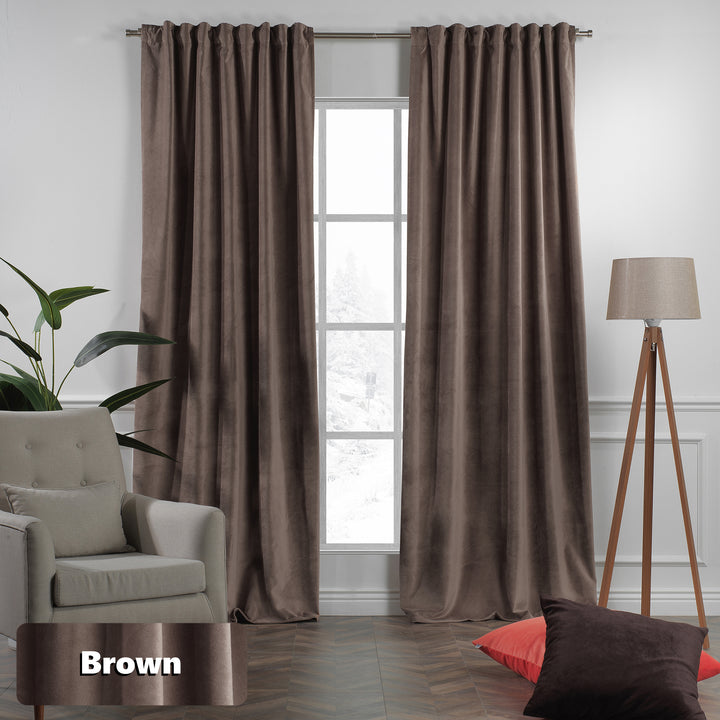 Custom eyelet‑top matte velvet curtain panel offering wide coverage and a clean modern fall.