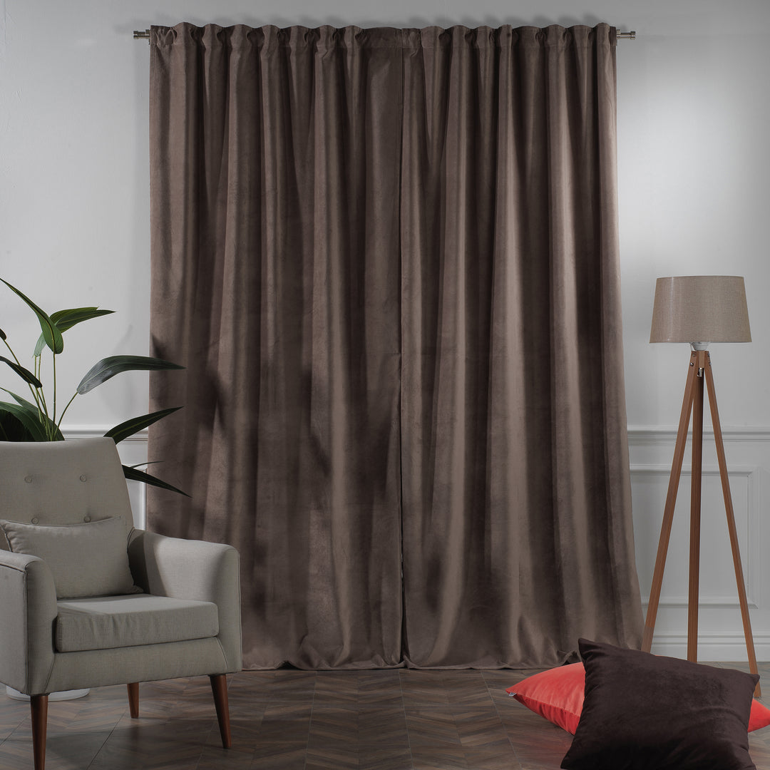 Made‑to‑measure matte velvet curtain with extended proportions and a soft, elegant downward flow.