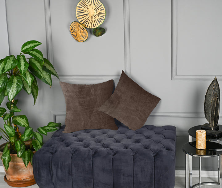 A made to measure cushion cover in warm medium‑brown matte velvet, featuring a smooth velvety surface and neatly finished edges for a classic premium style