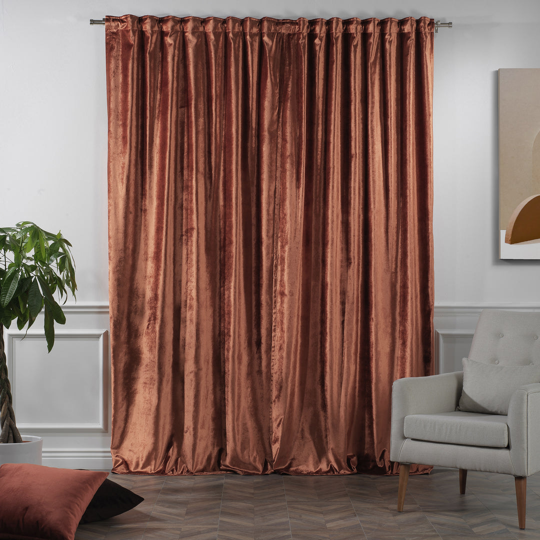 Full‑length shiny velvet curtain panel with light‑reflective texture and elegant movement.