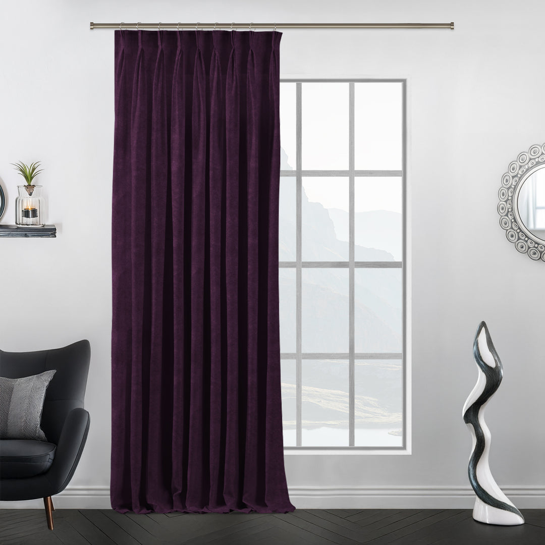 Matte velvet curtain with crisp pinch pleats, flowing full‑length drape and tailored finish.