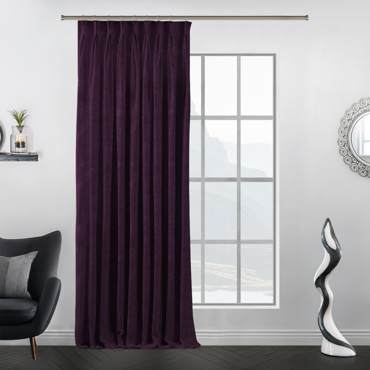 Matte velvet curtain with crisp pinch pleats, flowing full‑length drape and tailored finish.