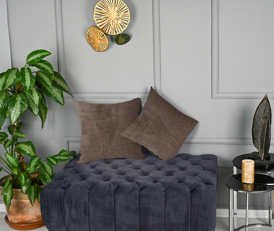 A made to measure cushion cover in warm cappuccino‑beige matte velvet, featuring a smooth plush texture and neatly finished seams for a polished premium appearance