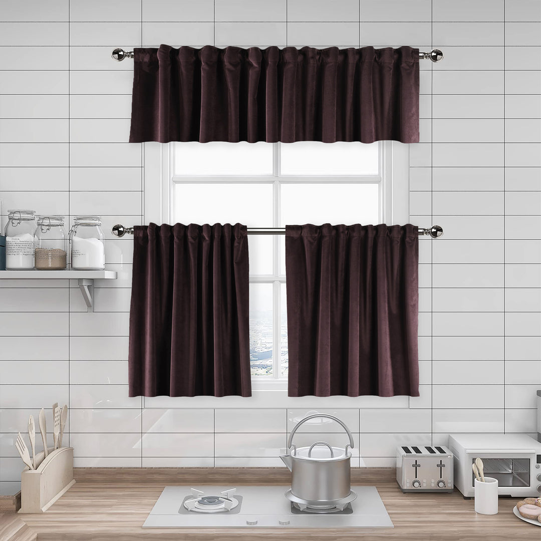 Brown kitchen curtain set hanging above a stove with tiled wall background