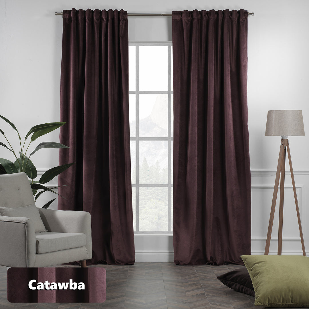 Extra‑long extra‑wide catawba matte velvet curtains hanging on window, blackout effect, elegant full coverage.