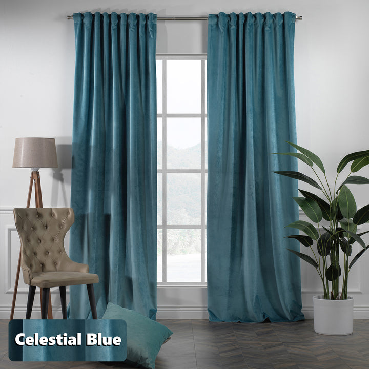 Extra‑long matte velvet eyelet curtain with soft folds and a contemporary ring finish.