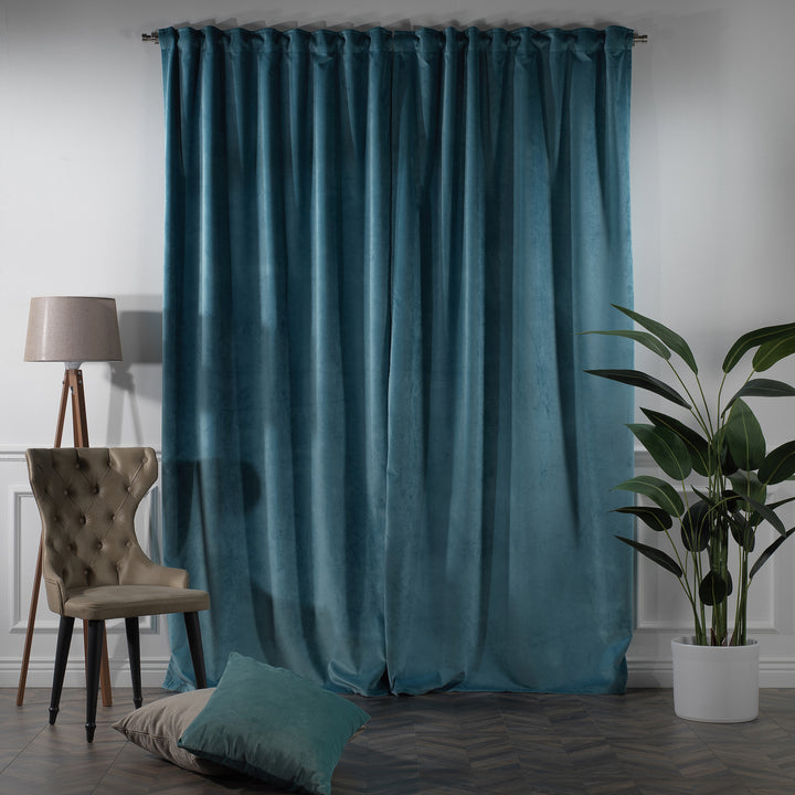 Extra‑long matte velvet curtain designed for wide coverage and a soft, weighty appearance