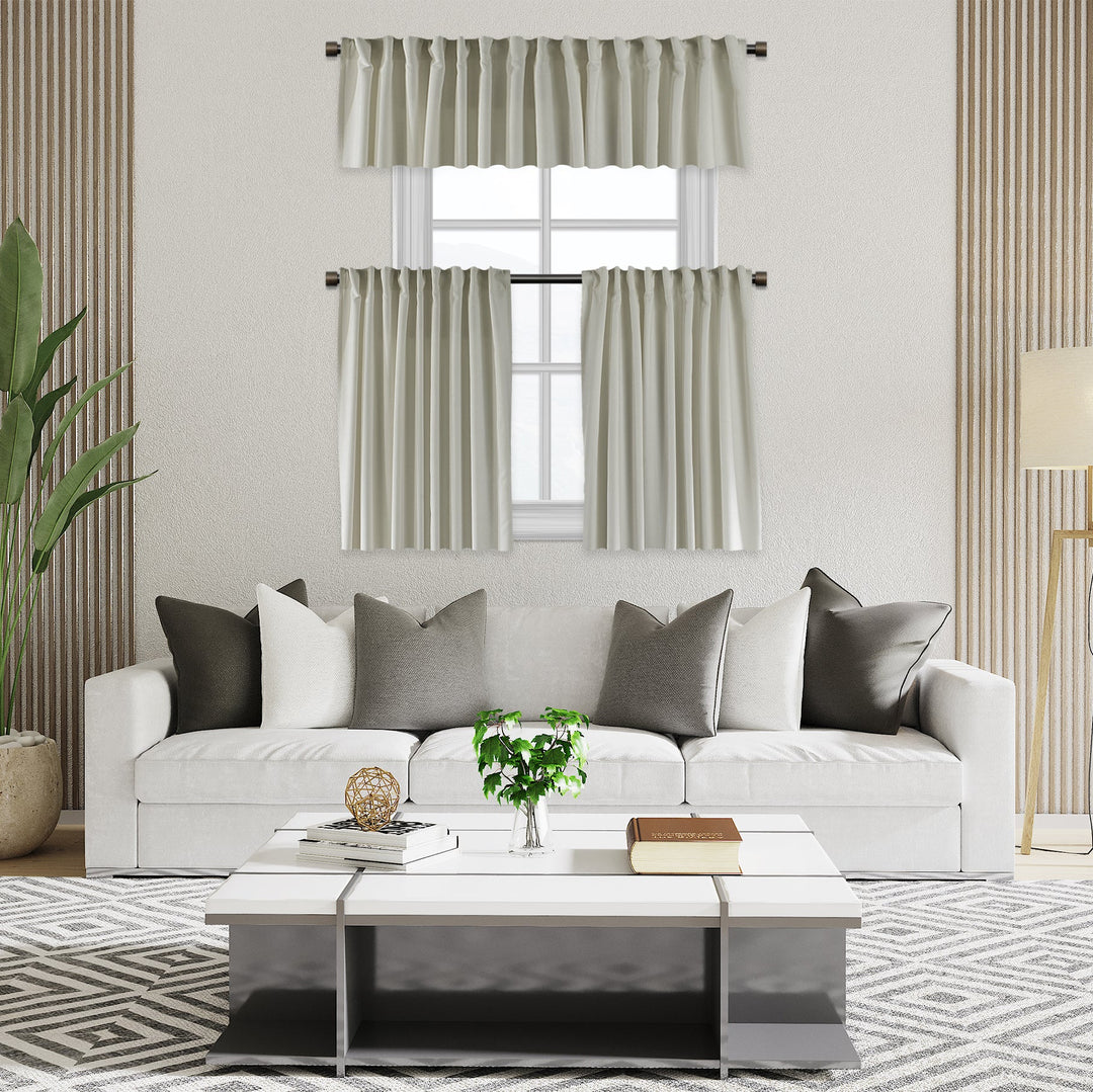 A made to measure kitchen valance in soft cream velour, featuring a smooth lightweight surface and neatly structured edges for a bright elegant finish