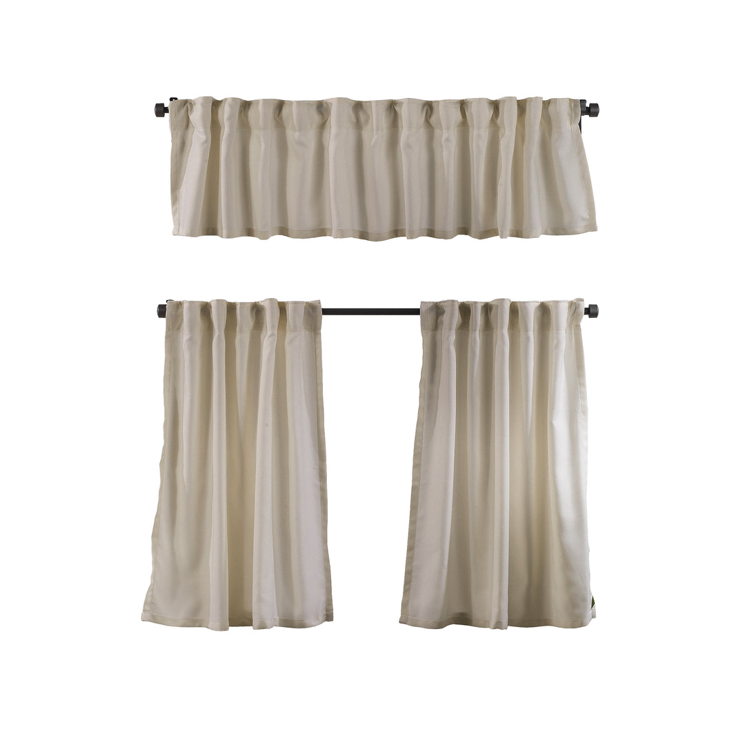 Cream linen‑look valance photographed closed, showing textured weave, soft daylight filtering and smooth decorative finish.