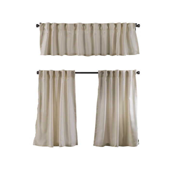 Cream linen‑look valance photographed closed, showing textured weave, soft daylight filtering and smooth decorative finish.