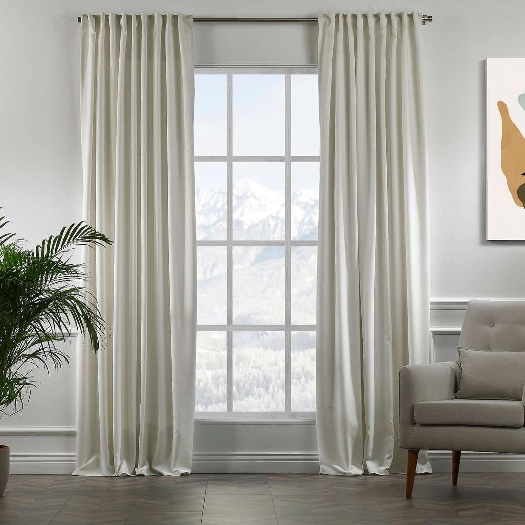 Cream velour curtains in full view, highlighting smooth pile, warm neutral tone and premium made‑to‑measure drape.