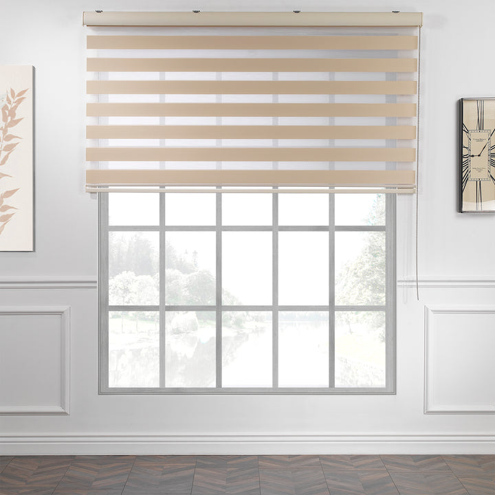 Made to measure cream zebra roller blind featuring warm-toned alternating sheer and dim‑out stripes for soft light control and balanced privacy, highlighting its gentle creamy shade, smooth woven texture and elegant contemporary day‑and‑night blind design.