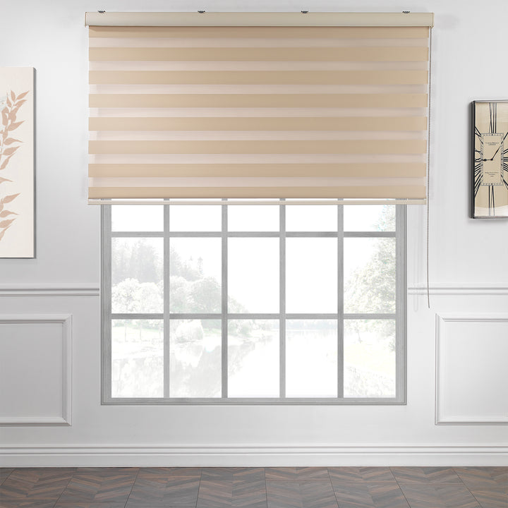 Made to measure cream zebra roller blind featuring warm-toned alternating sheer and dim‑out stripes for soft light control and balanced privacy, highlighting its gentle creamy shade, smooth woven texture and elegant contemporary day‑and‑night blind design.