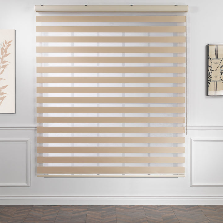 Made to measure cream zebra roller blind featuring warm-toned alternating sheer and dim‑out stripes for soft light control and balanced privacy, highlighting its gentle creamy shade, smooth woven texture and elegant contemporary day‑and‑night blind design.