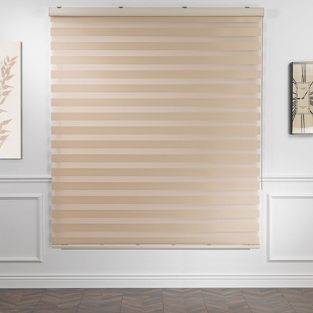 Made to measure cream zebra roller blind featuring warm-toned alternating sheer and dim‑out stripes for soft light control and balanced privacy, highlighting its gentle creamy shade, smooth woven texture and elegant contemporary day‑and‑night blind design.