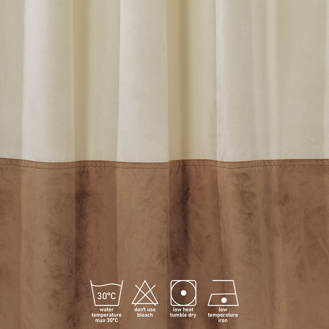  A close‑up of a cream and brown matte velvet block curtain, displaying the subtle texture and clean colour separation
