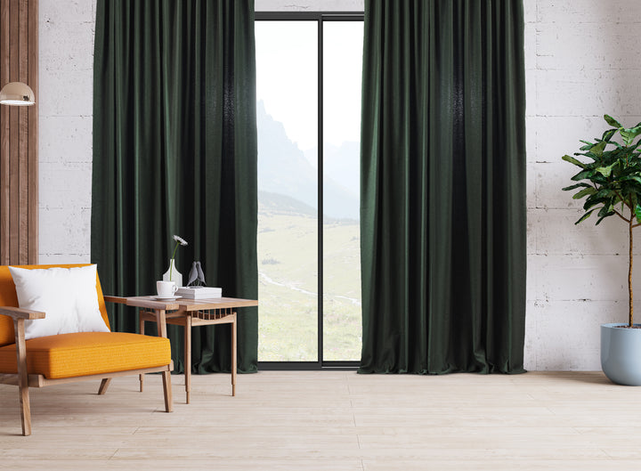 An extra‑long wide linen‑look door curtain in duck green, highlighting smooth folds, daylight depth and a premium earthy finish