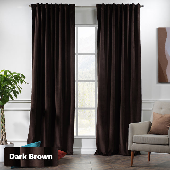 Extra‑wide matte velvet eyelet curtain offering a long, uninterrupted fall.
