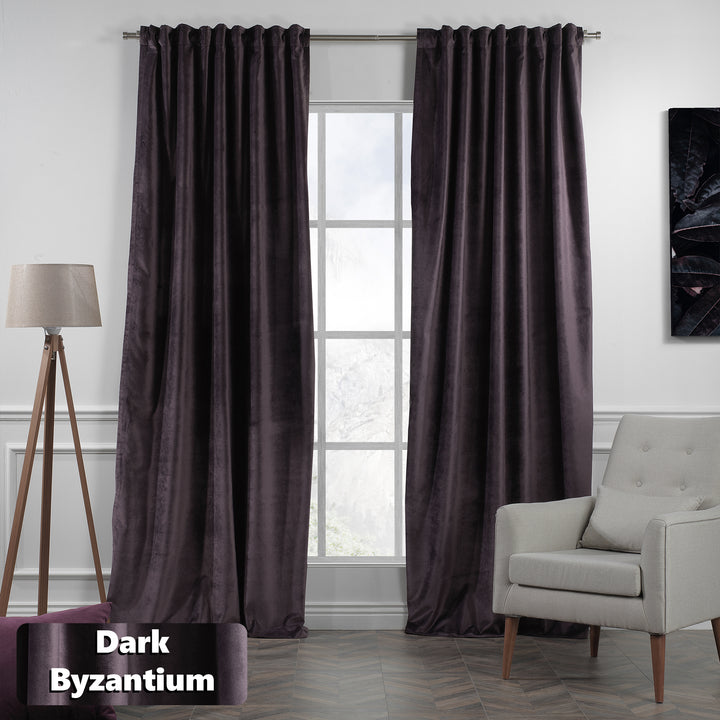 Matte velvet curtain with eyelet header, soft drape and a refined tailored appearance.
