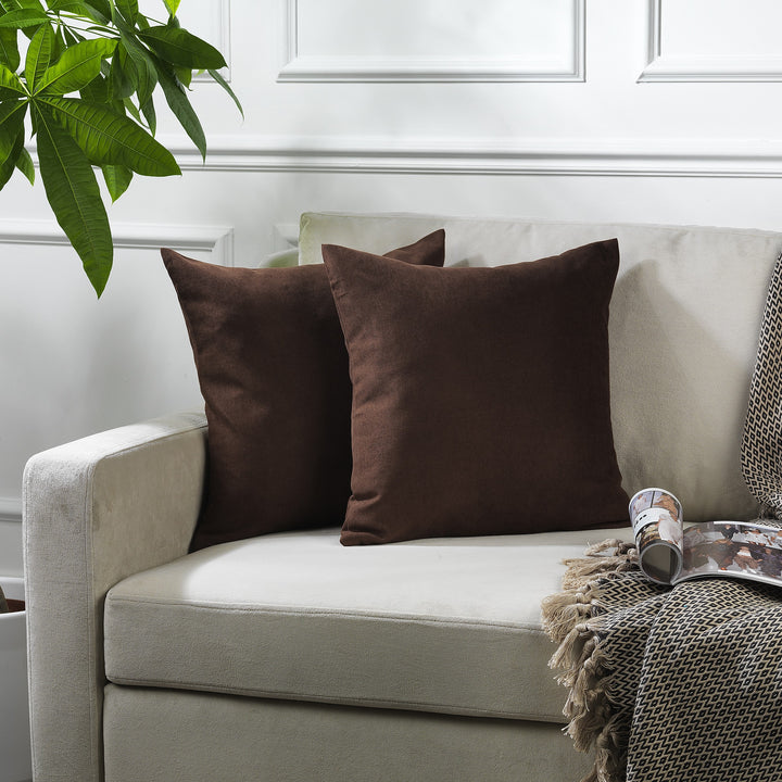 A made to measure cushion cover in deep chocolate‑brown velour, shown with a plush lightweight texture and crisp tailored edges for a warm premium style