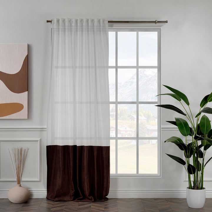 A made to measure dark brown velvet and sheer block curtain, showing rich texture, soft drape and a refined layered finish