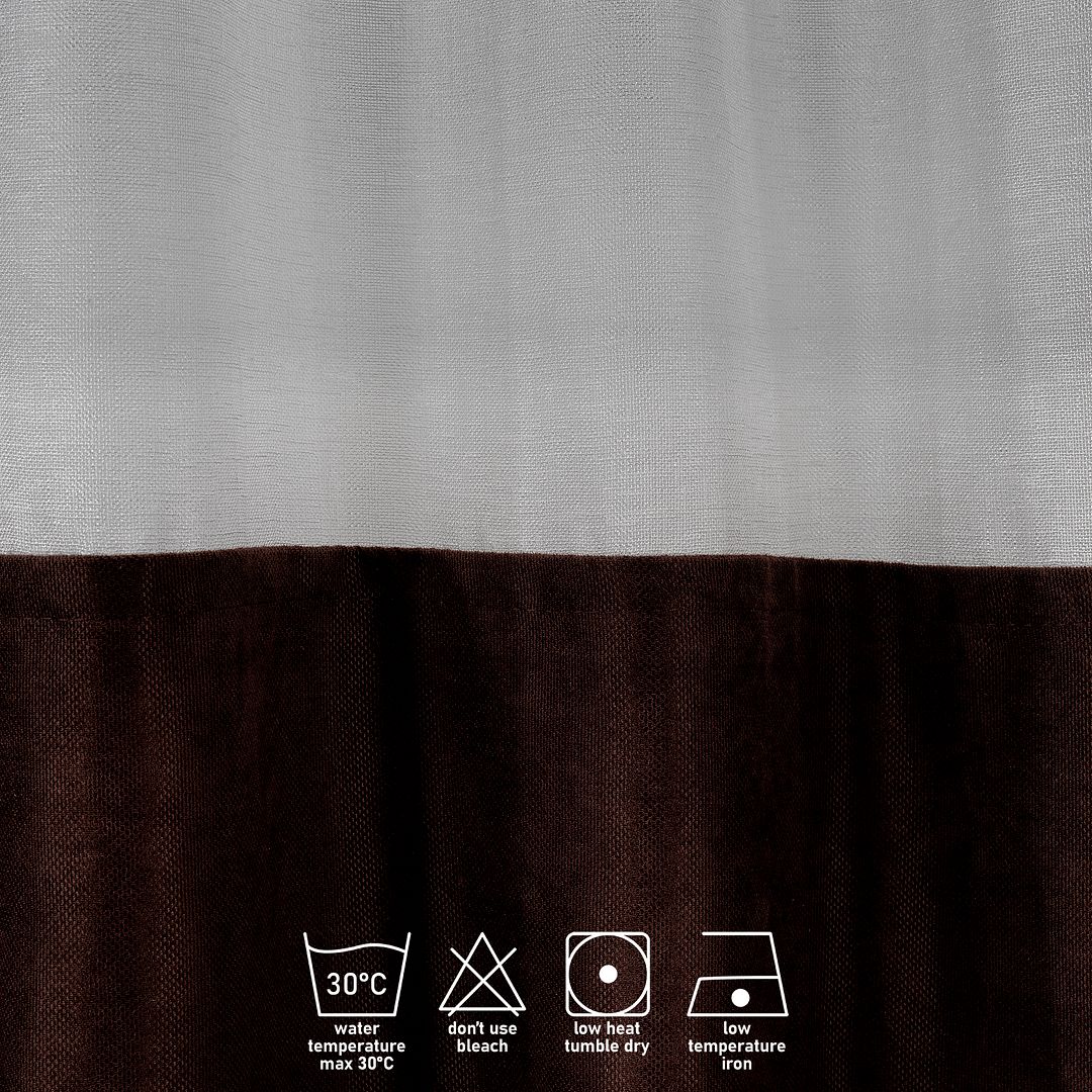 A close‑up of a dark brown velvet and sheer block curtain, highlighting the smooth velvet surface and light‑filtering sheer layer