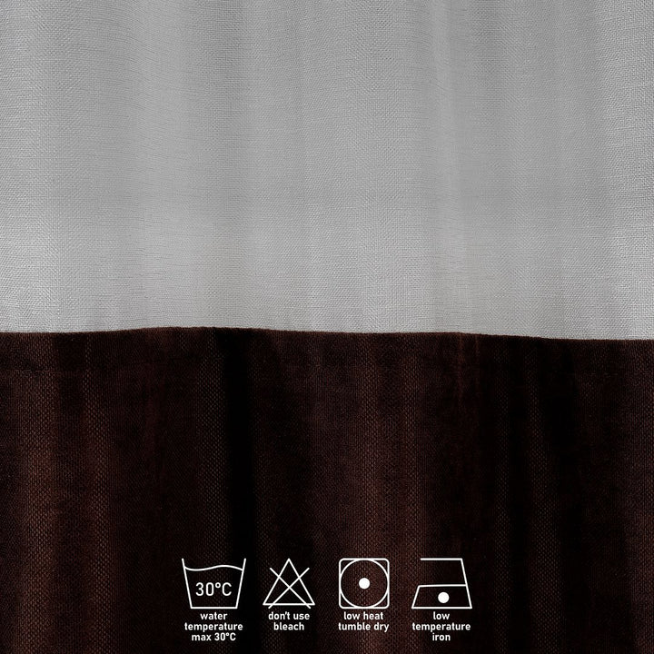 A close‑up of a dark brown velvet and sheer block curtain, highlighting the smooth velvet surface and light‑filtering sheer layer