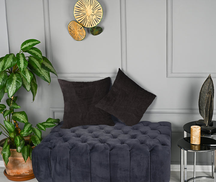 A made to measure cushion cover in deep chocolate‑brown matte velvet, featuring a velvety surface and refined edges for a rich luxurious look
