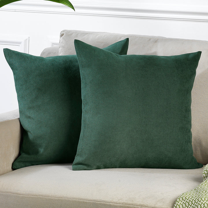 A made to measure cushion cover in deep forest‑green velour, shown with a plush lightweight surface and crisp edges for a rich natural finish
