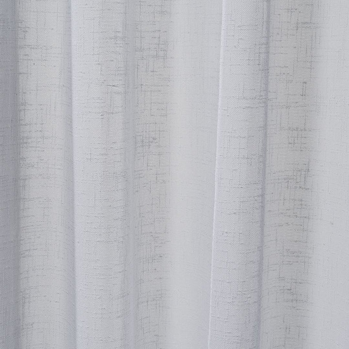 Close-up of a white linen semi sheer curtain