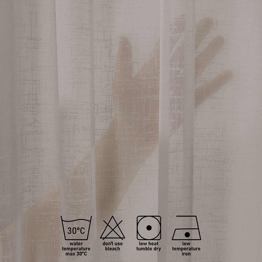 Faux brown linen semi sheer with care label symbols on a textured fabric background