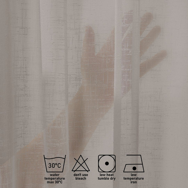 Faux brown linen semi sheer with care label symbols on a textured fabric background