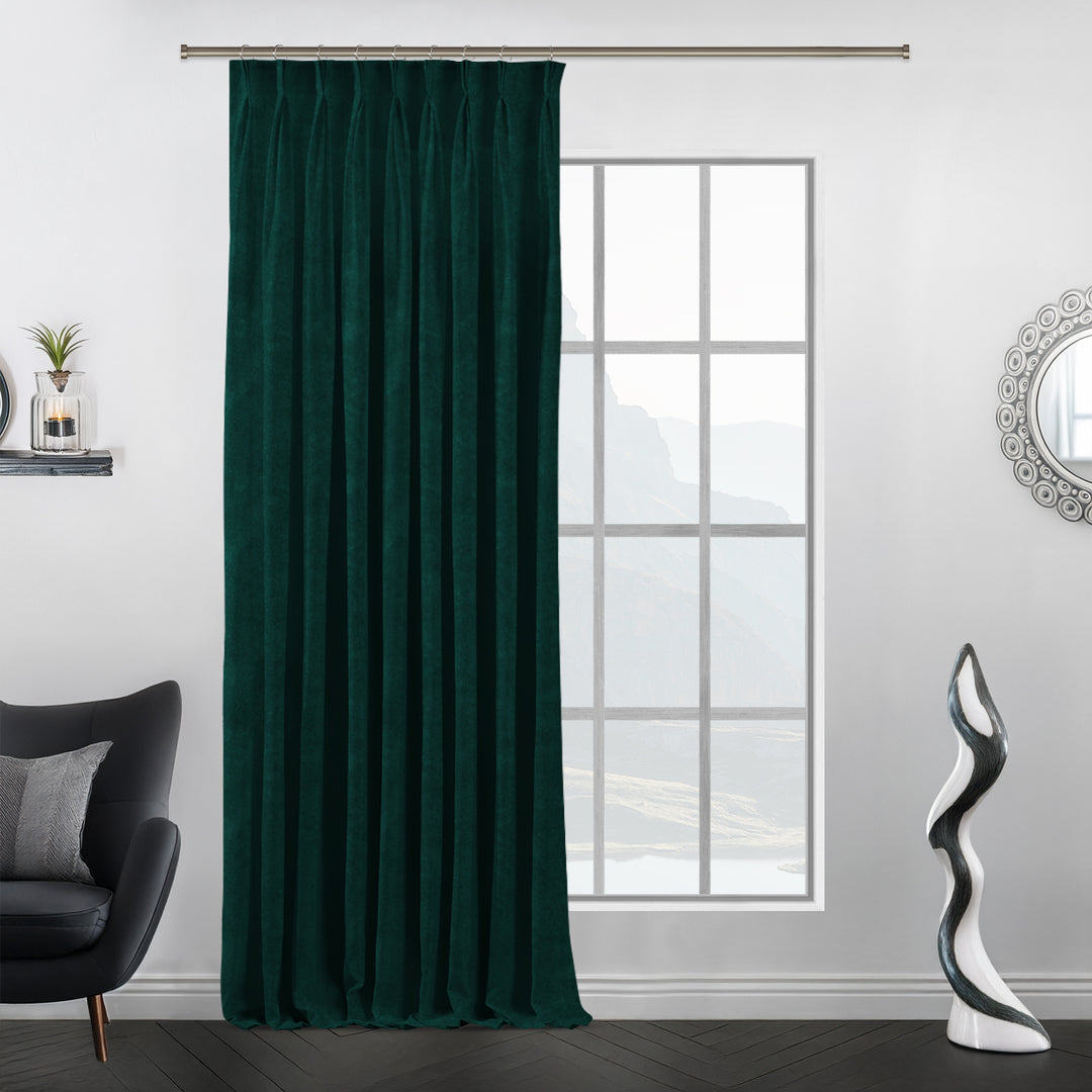 Matte velvet pinch pleat curtain with precise handcrafted pleats and a long tailored drop.