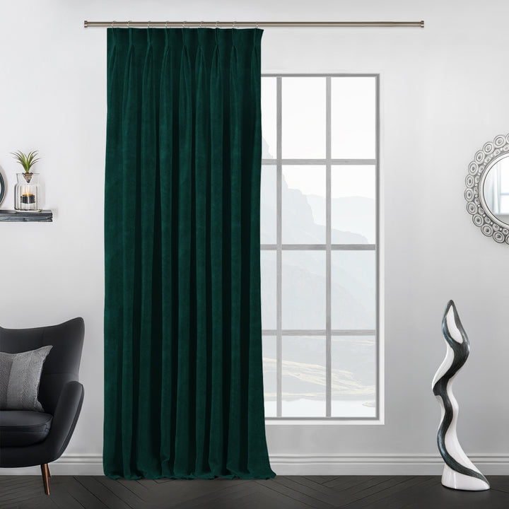 Matte velvet pinch pleat curtain with precise handcrafted pleats and a long tailored drop.
