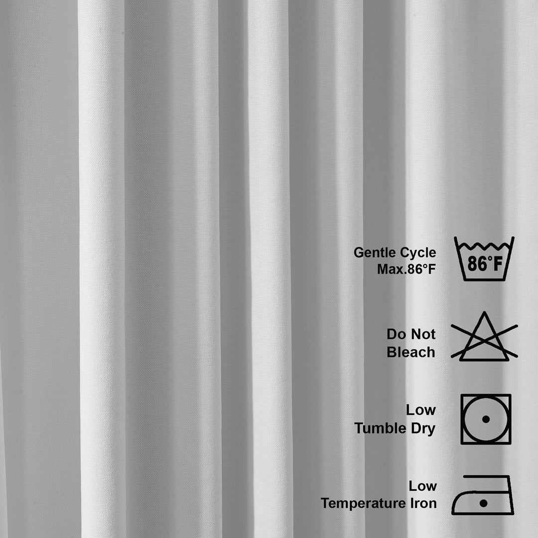 Gray fabric with laundry care symbols and text on a white background