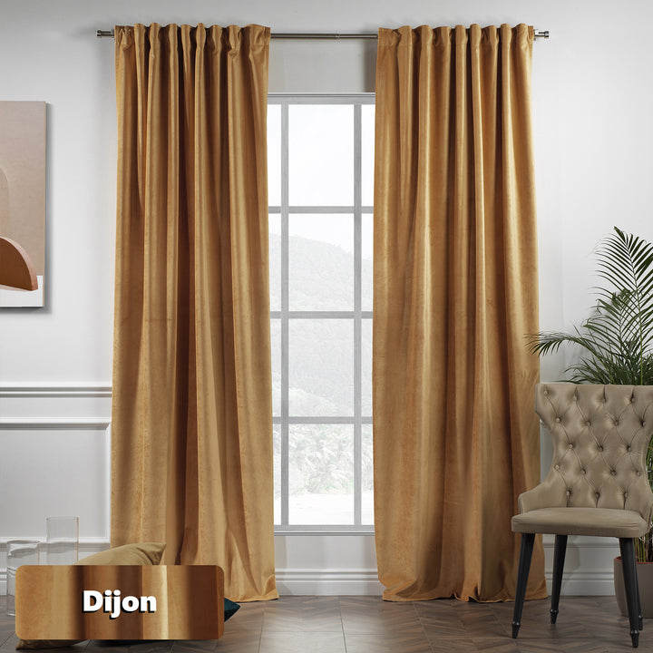 Golden mustard velvet eyelet curtain panel with smooth, weighty fall.