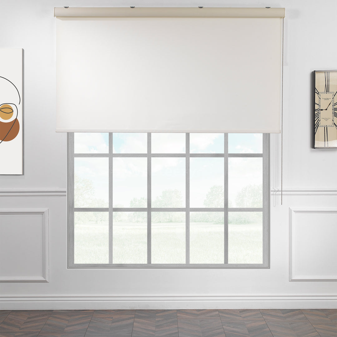 An ecru room darkening roller blind made to measure, shown lowered with a natural woven surface and smooth minimal edges reducing incoming light