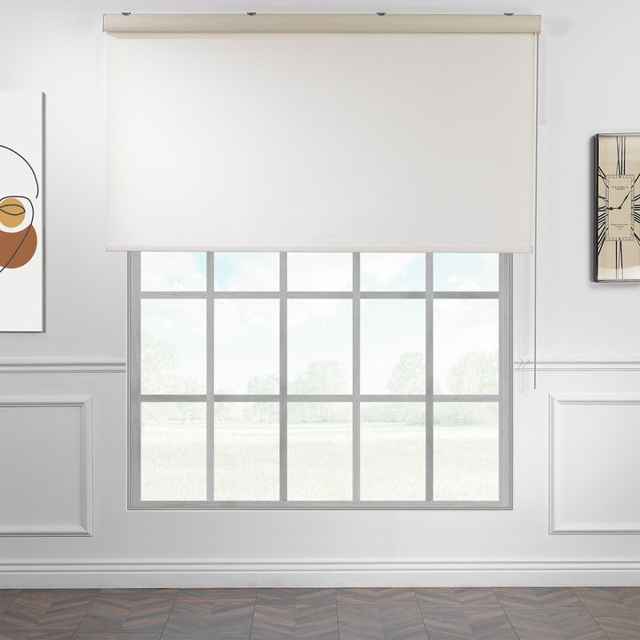 An ecru room darkening roller blind made to measure, shown lowered with a natural woven surface and smooth minimal edges reducing incoming light