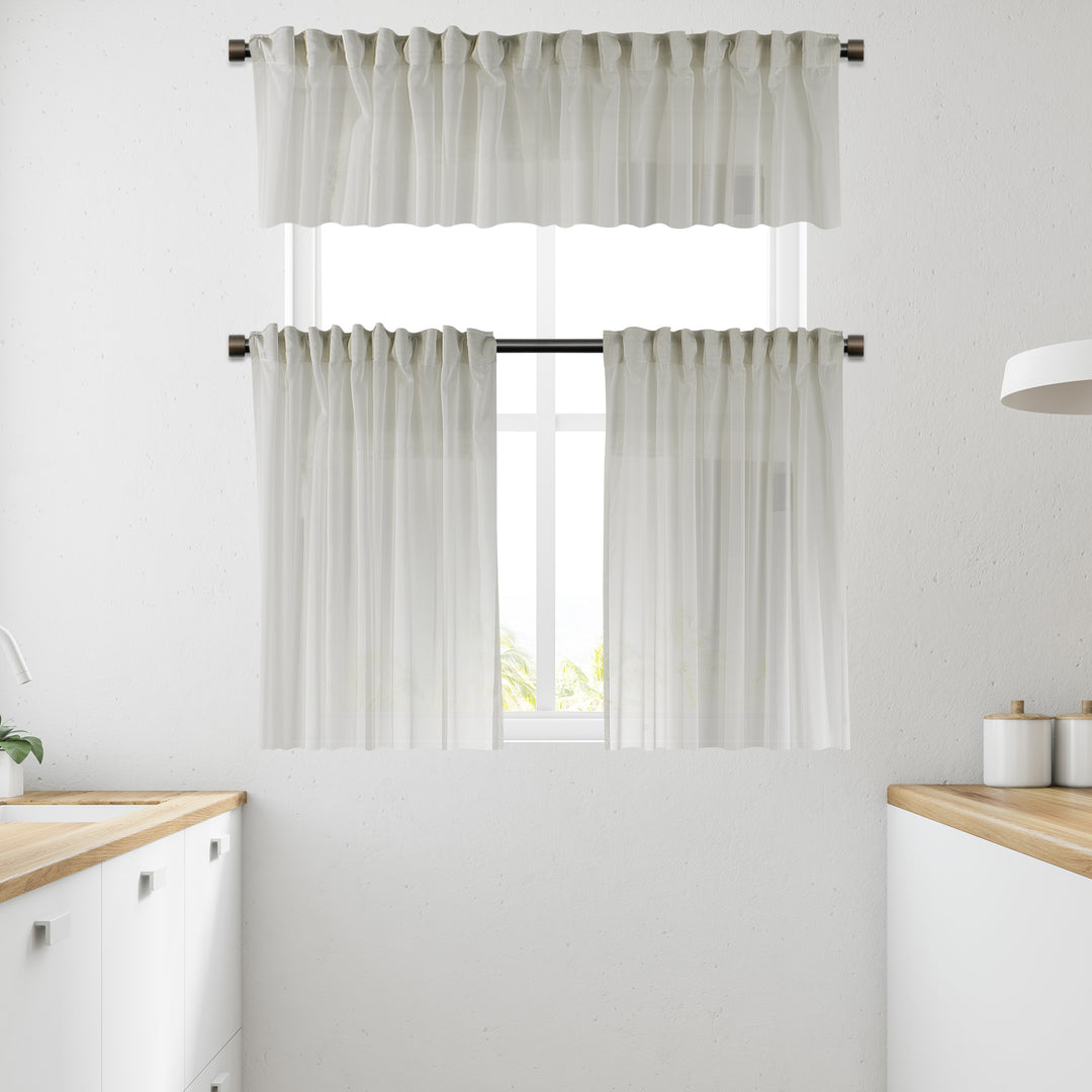 Ecru sheer faux silk valance with fine woven texture, soft translucency and elegant lightweight fall.