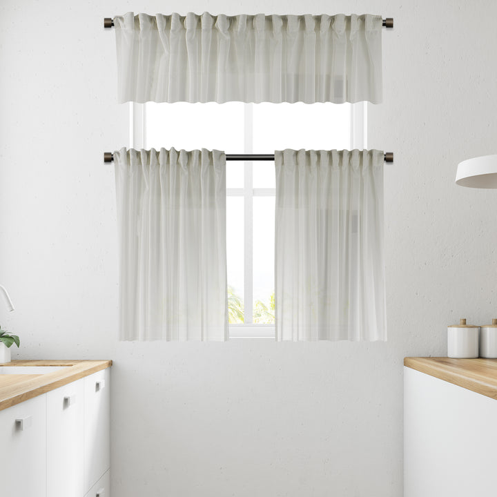 Ecru sheer faux silk valance with fine woven texture, soft translucency and elegant lightweight fall.