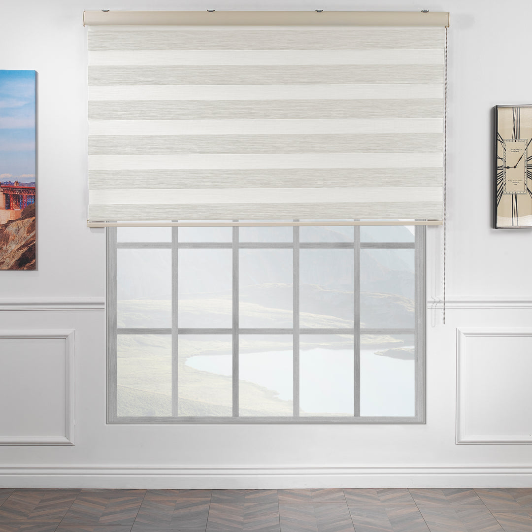 Made to measure zebra roller blind in ecru, featuring alternating sheer and opaque horizontal stripes for adjustable light control and privacy, showcasing the soft neutral tone, smooth texture and contemporary day‑and‑night blind design.