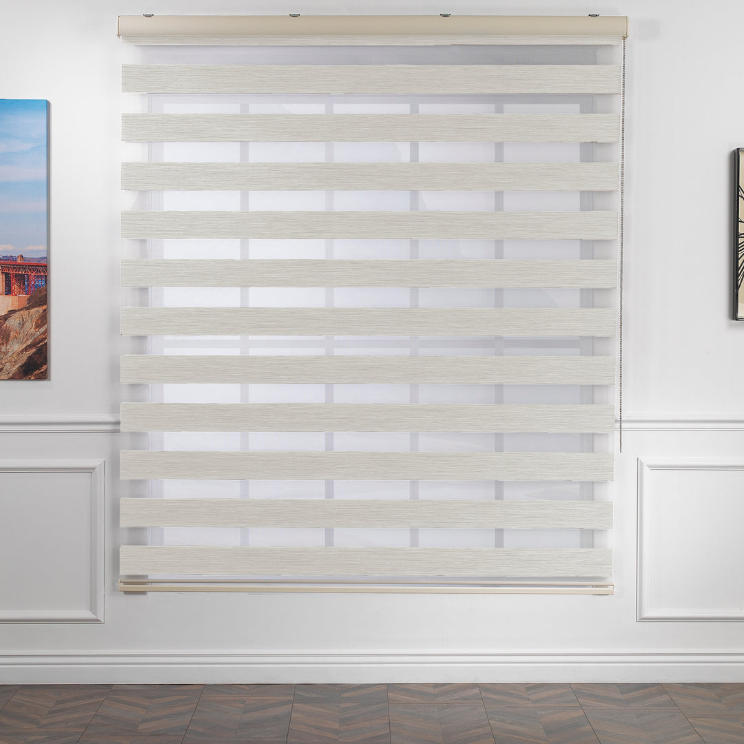 Made to measure zebra roller blind in ecru, featuring alternating sheer and opaque horizontal stripes for adjustable light control and privacy, showcasing the soft neutral tone, smooth texture and contemporary day‑and‑night blind design.