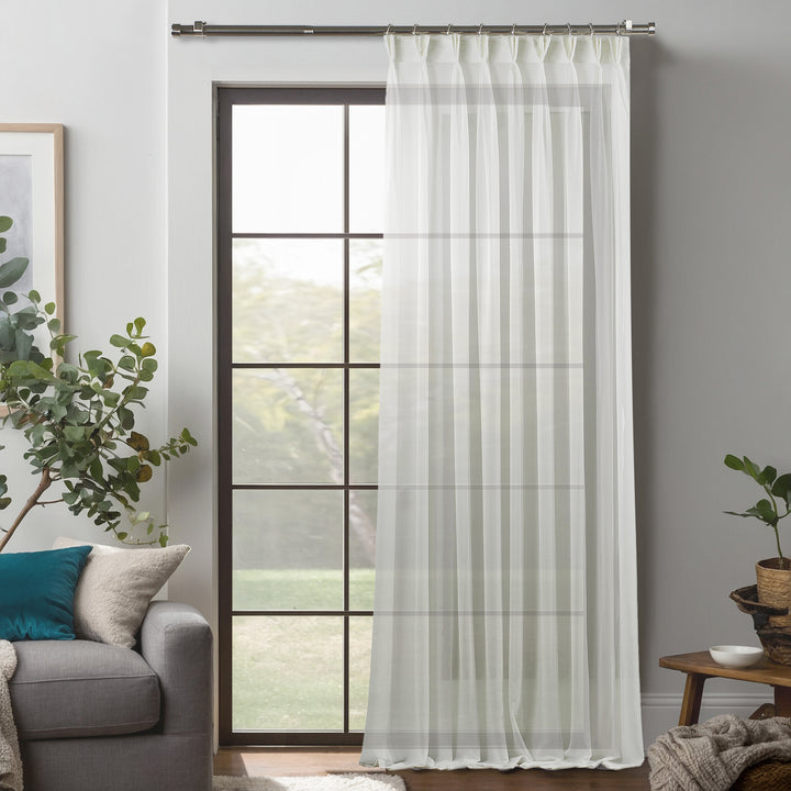 Extra‑long and extra‑wide Ecru silk‑crepe pinch‑pleated curtain, made to measure, featuring crisp tailored pleats and softly diffused daylight