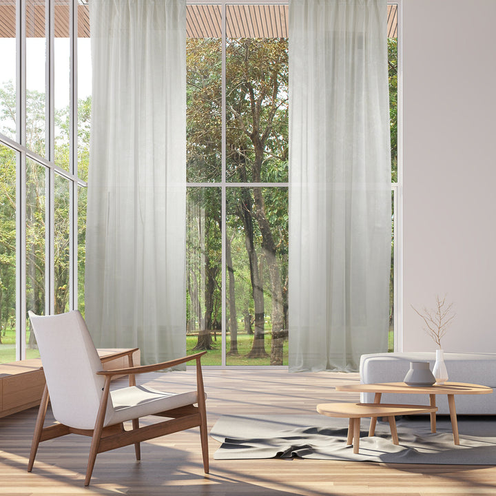 Extra‑wide made‑to‑measure Ecru sheer silk‑crepe curtain featuring a lightweight airy drape and softly diffused daylight.
