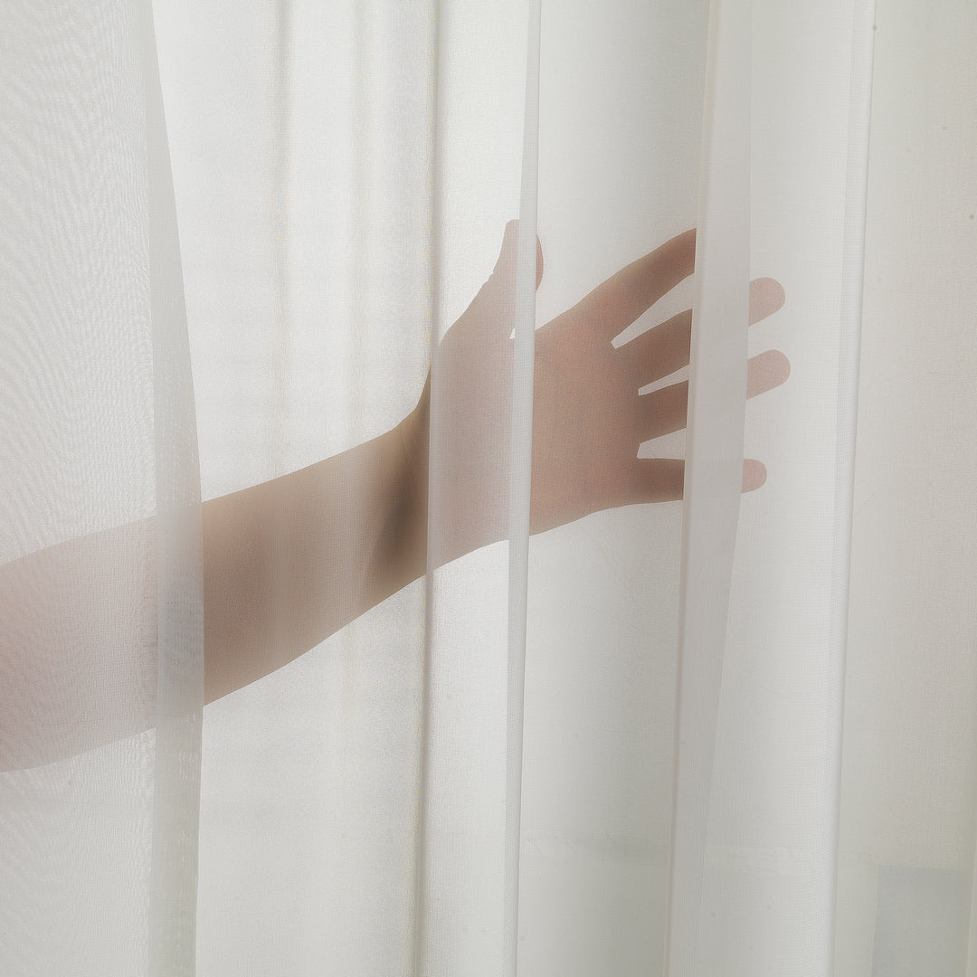 Close‑up of Ecru sheer silk‑crepe curtain showing fine crepe grain, delicate woven texture and softly diffused natural light, made to measure