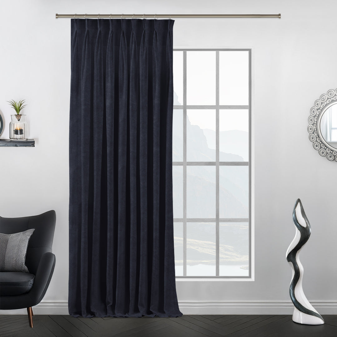 Tailored pinch pleat matte velvet panel with crisp pleats and a smooth, weighty texture.
