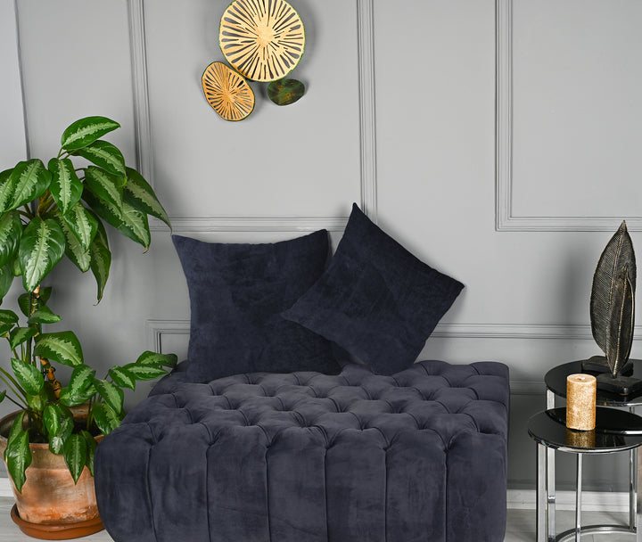 A made to measure cushion cover in deep charcoal‑grey matte velvet, shown with a smooth plush texture and crisp refined edges for a modern elegant look