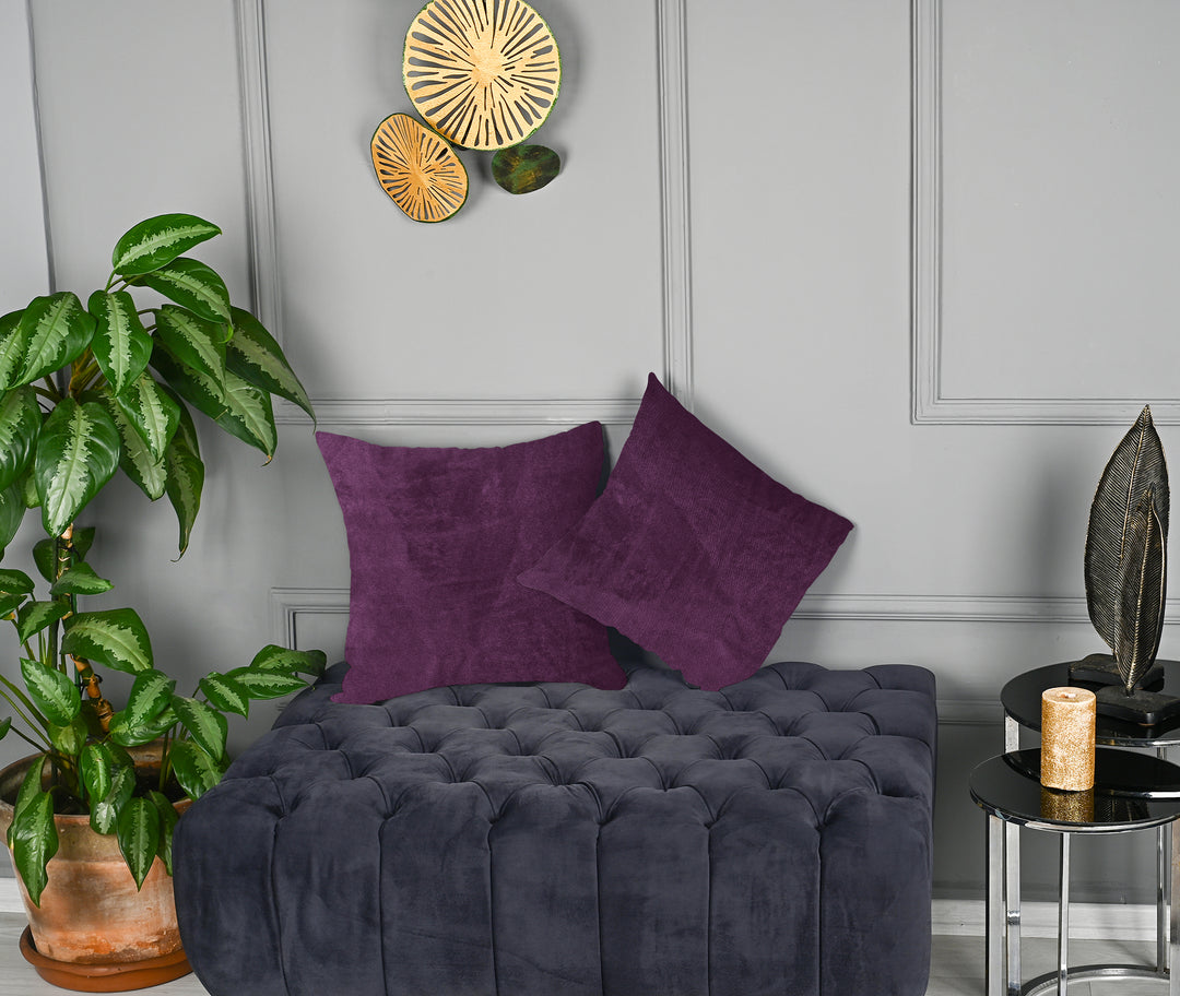 A made to measure cushion cover in deep royal‑purple matte velvet, shown with a smooth plush texture and neatly refined seams for a bold elegant finish