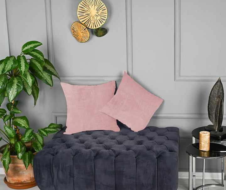 A made to measure cushion cover in bright flamingo‑pink matte velvet, shown with a smooth plush texture and clean structured edges for a lively modern finish