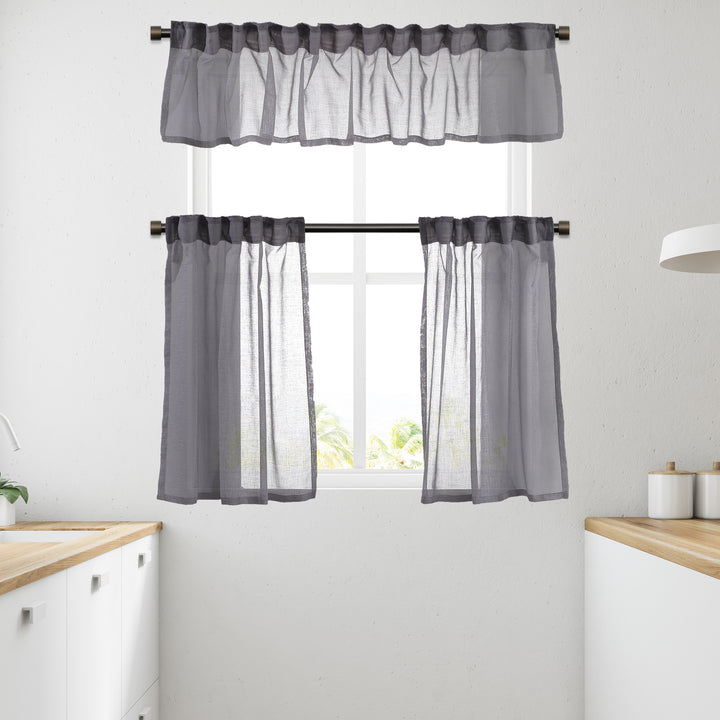 Grey linen‑look sheer valance with textured weave, cool tone and airy daylight translucency.